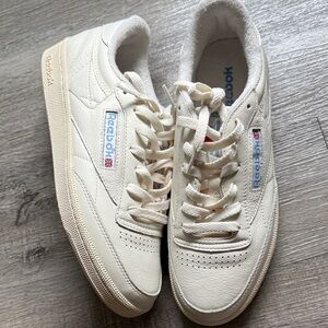 Reebok Off-White Sneakers with Blue Details